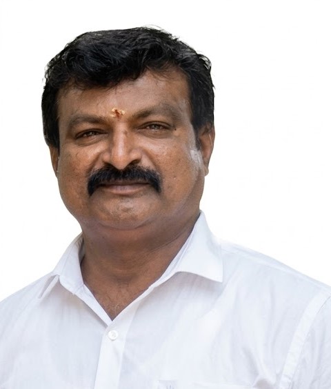 Mr. Saravanan, owner of KSR Traders Rice